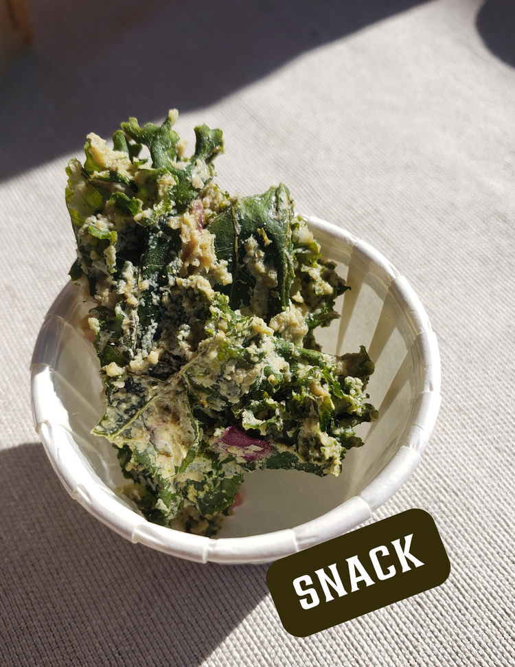 Crunchy kale chips in a cup